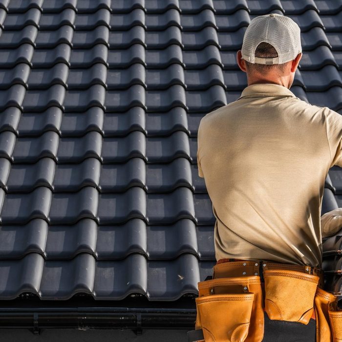 imgi_150_Professional-Roofer-with-Roof-Tiles