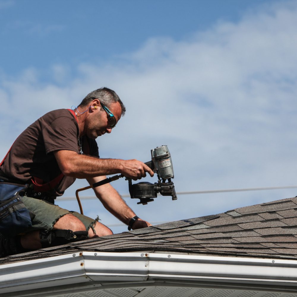 Man renovating a roof.