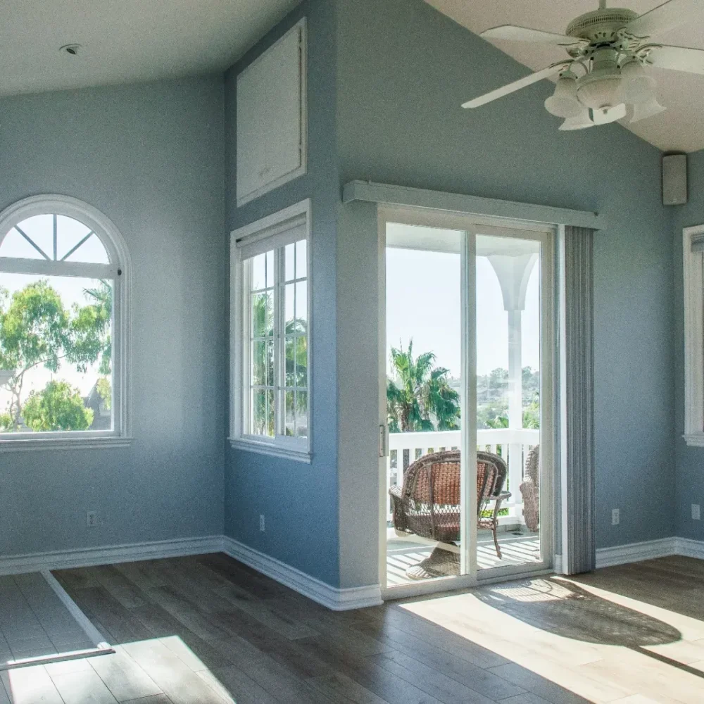imgi_52_StockPaintingtrendy-modern-interior-living-room-with-blue-walls-white-windows