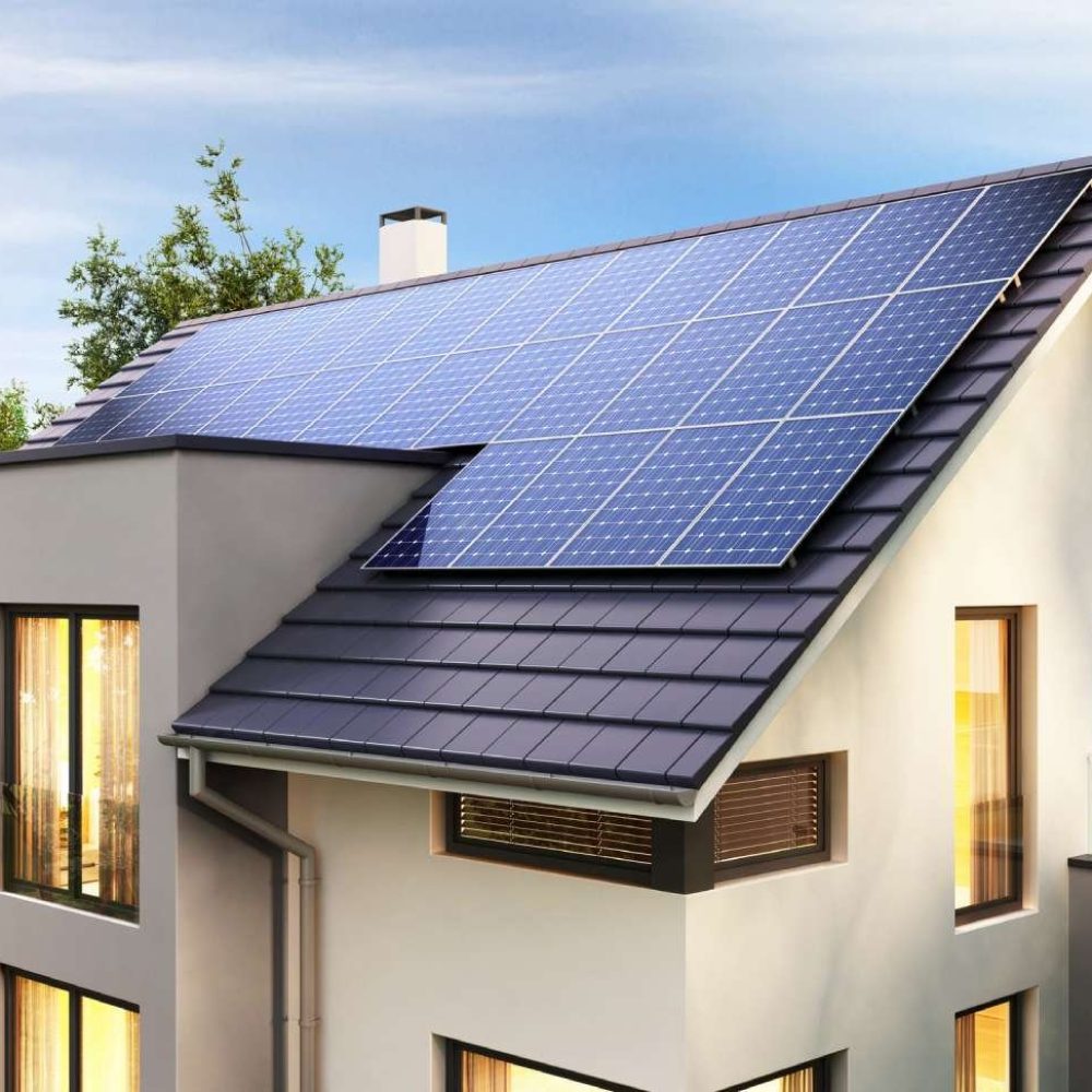 Solar panels on the gable roof of the beautiful house